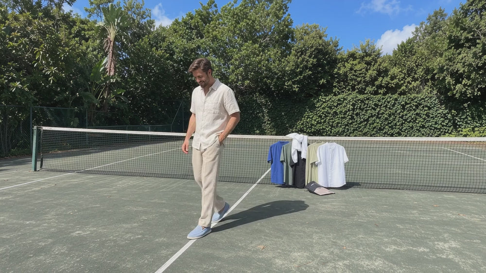 Cape Town short sleeve linen shirt, worn by model M2 on a tennis court.